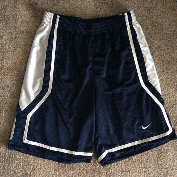 navy blue and white nike shorts